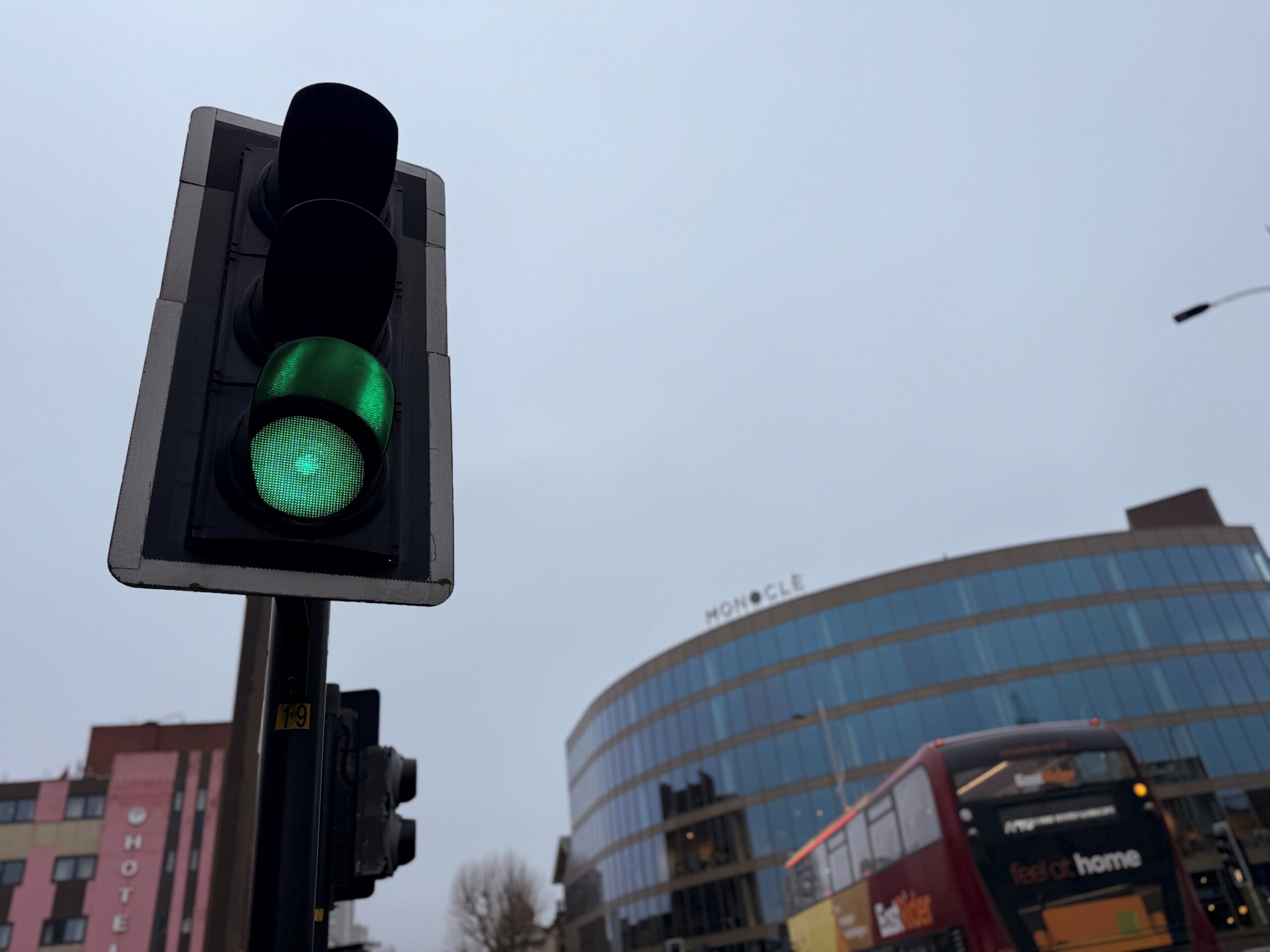 An image of the traffic signals at the Ferensway and Anlaby Road junction with the Monocle building in the background.