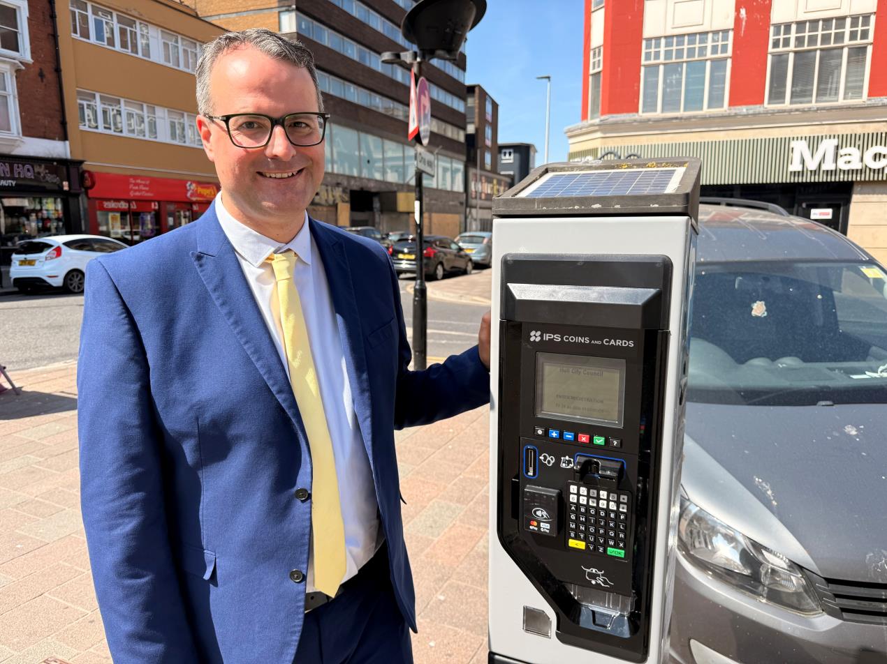 Councillor Mark Ieronimo with one of Hull's new pay & display car parking machines