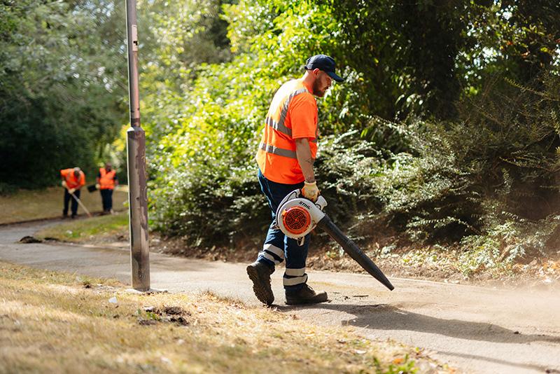 A Hull City Council worker with a leaf blower