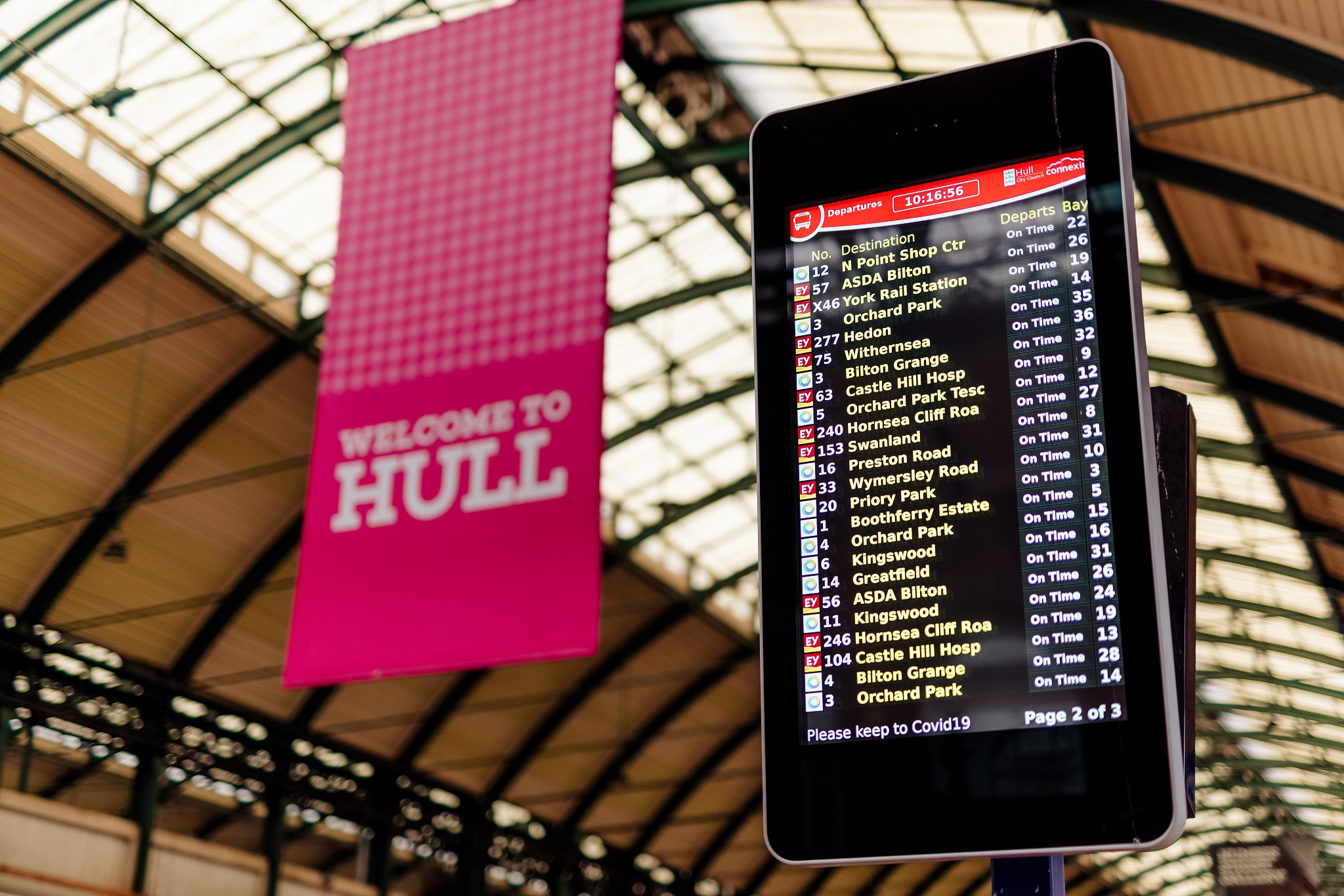 A digital bus information display screen at Hull Paragon Interchange.